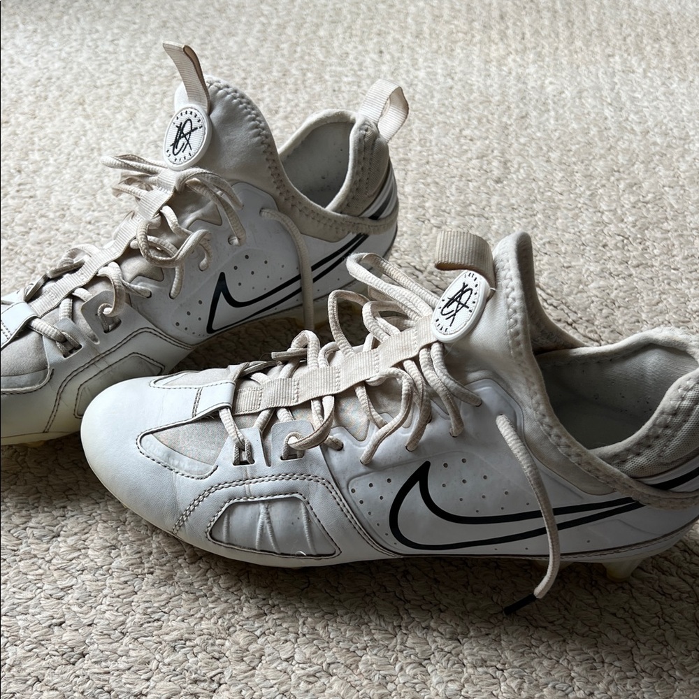 Nike Huarache 9 Varsity LAX White Cleats with Black Swoosh